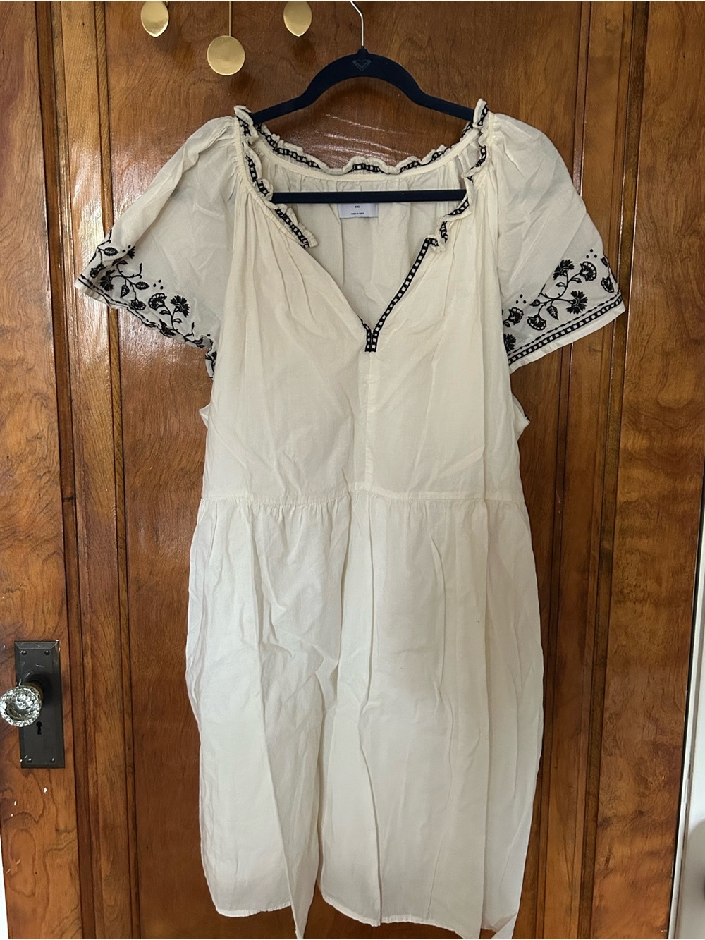White dress with black embroidered details